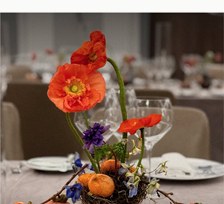 Orange poppies and a table setting